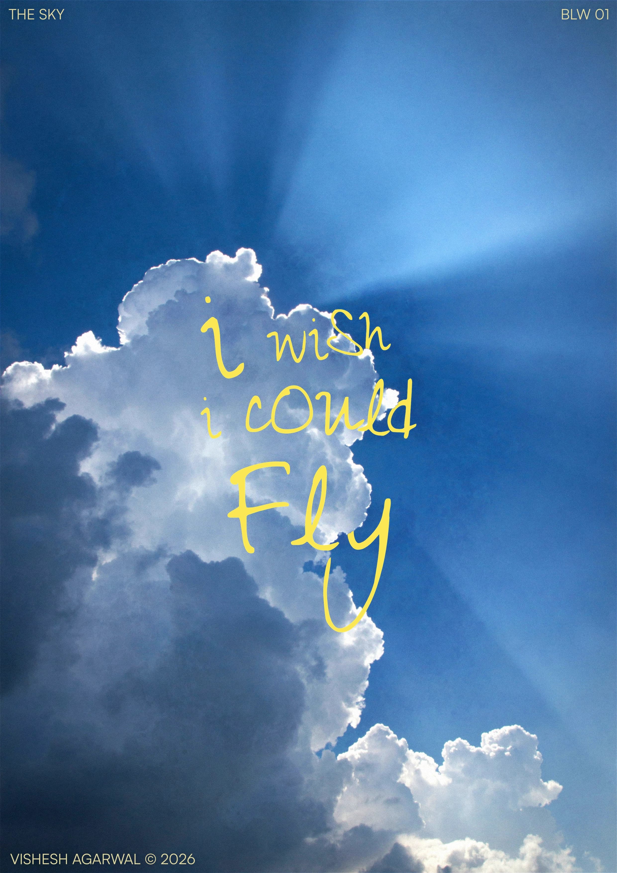 A grainy photograph of a towering summer cloud illuminated by sunlight against a deep blue sky. Written in bright yellow across the cloud, the words “I wish I could fly” capture a child’s quiet wonder and longing to take flight on a summer afternoon.